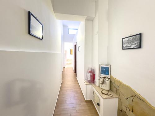 TV a/nebo společenská místnost v ubytování Casa dei nodi