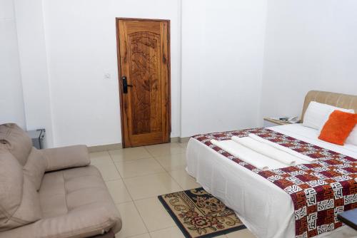 Postel nebo postele na pokoji v ubytování New Hotel Sossa