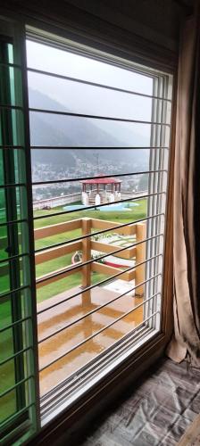 Balkón nebo terasa v ubytování Highland Club Balakot