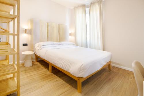 Letto o letti in una camera di Albium Hotel