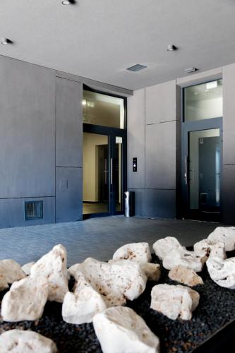 a pile of rocks on the floor of a building at Luxury City-Center Apartment in Bratislava - Parking Included in Bratislava