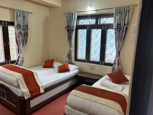 Katil atau katil-katil dalam bilik di Hotel Beijing Lu