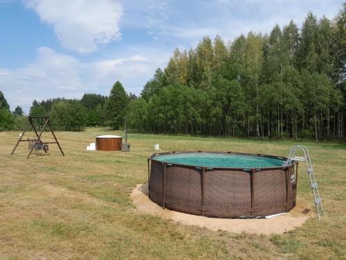 Afbeelding uit fotogalerij van Domki letniskowe Jastrzębna in Sztabin