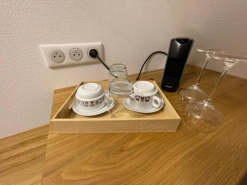 Kemudahan buat kopi dan teh di chambresdusoleil