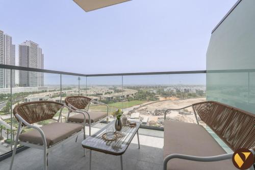Vogue Vacation Homes, Damac Hills Golf Gate near First Avenue Mall, Two Bedroom Apartment with Balcony and Vibrant Community View, Access to all Amenities
