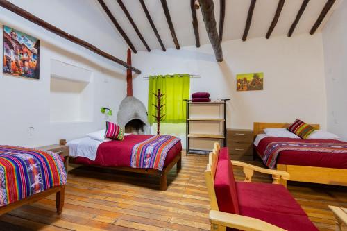 Postel nebo postele na pokoji v ubytování Tucan Hostel