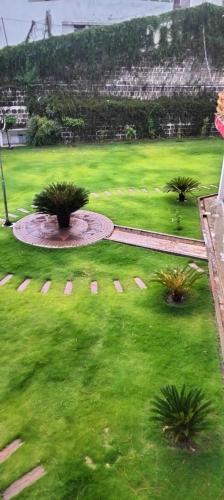 Zahrada ubytování Highland Club Balakot