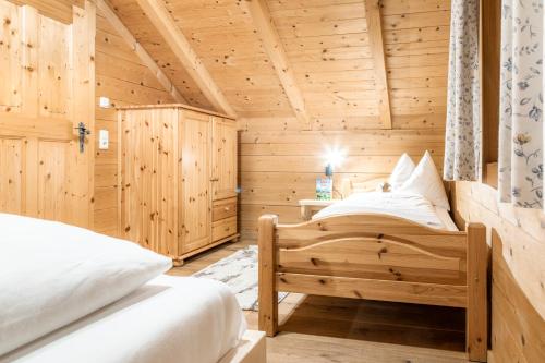 Una cama o camas en una habitación de Chalet Gretchen Ruhe