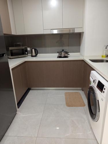 Η κουζίνα ή μικρή κουζίνα στο Agile KLCC Suites By TRX