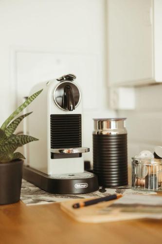 a toaster sitting on top of a kitchen counter at "La Maisonnette" Cozy tiny house close to Montreux in Villeneuve