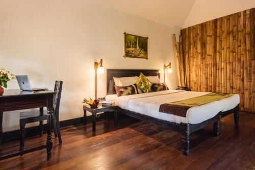 Amritara Shalimar Spice Garden Resort & Spaにあるベッド