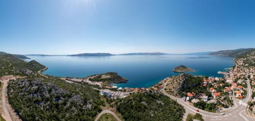 an aerial view of a town next to a body of water at Apartmani Olimp2 in Sveti Juraj
