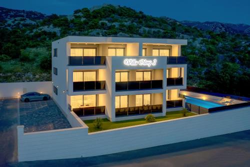 a rendering of a apartment building at night at Apartmani Olimp2 in Sveti Juraj