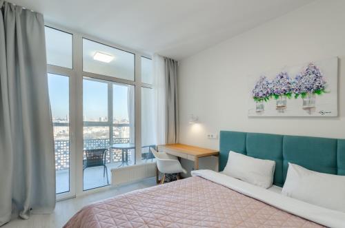 Ένα ή περισσότερα κρεβάτια σε δωμάτιο στο Petrovdom Apartments 17-86а in RC Kvartet , Vasyl Lypkivskyi 16а