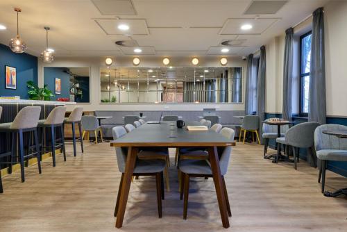 a conference room with a table and chairs at For Students Only - Studio Rooms in Reading in Reading