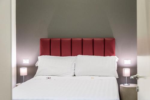 Un ou plusieurs lits dans un hébergement de l'établissement Hotel Castellino Roma
