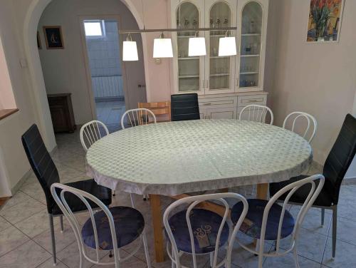 a dining room with a table and chairs at Holiday home in Siofok - Balaton 19638 in Siófok