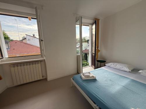Postel nebo postele na pokoji v ubytování Grazioso alloggio a 10 minuti dal centro