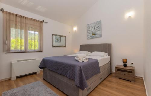 Ένα ή περισσότερα κρεβάτια σε δωμάτιο στο Beautiful Villa Mia with pool in Makarska