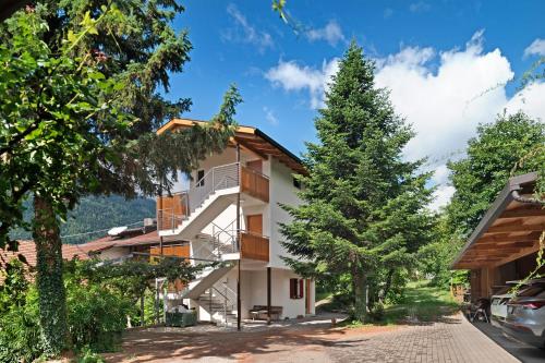 a house with a staircase on the side of it at Unterdornerhof Algund in Lagundo