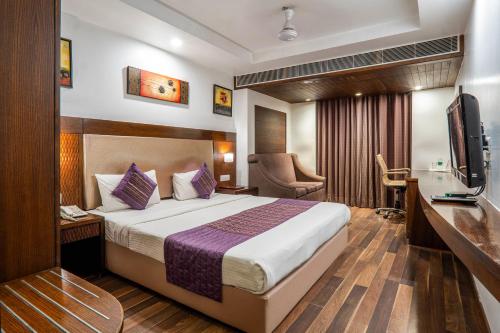 Postel nebo postele na pokoji v ubytování Hotel Le Roi Near New Delhi Railway Station