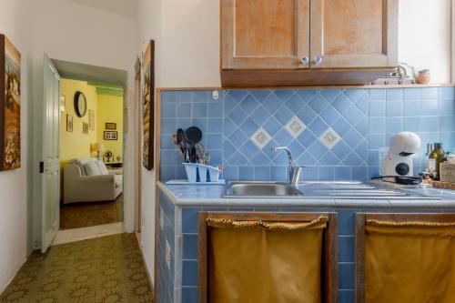 Una cocina o zona de cocina en GuestHost - La Meridiana