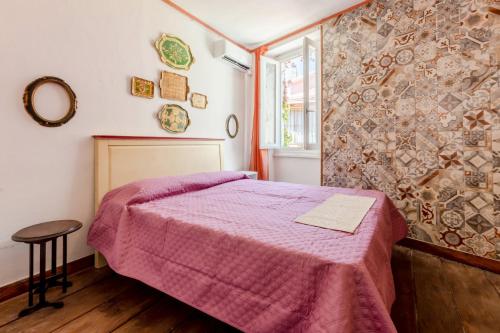 Cama o camas de una habitación en GuestHost - La Meridiana