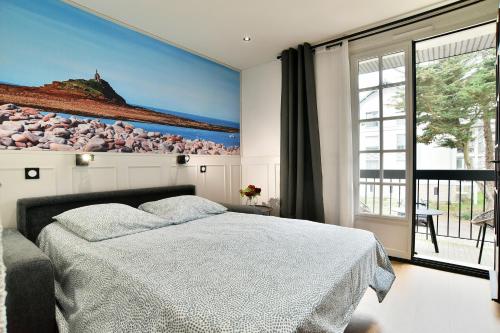 Postel nebo postele na pokoji v ubytování Julie 15 - A 200m de la plage