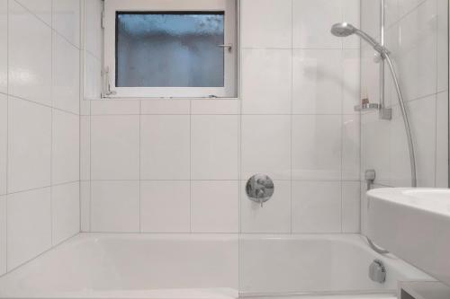 Ένα μπάνιο στο Ferienwohnung Kneissler