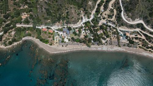 an aerial view of a resort on a beach at Tortuga Dafni Bay Villas Diver's Paradise by "elite" in Vasilikos