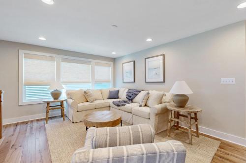 a living room with a couch and two chairs at Marlin Chase --- 30340 Bermuda Dr in Ocean View