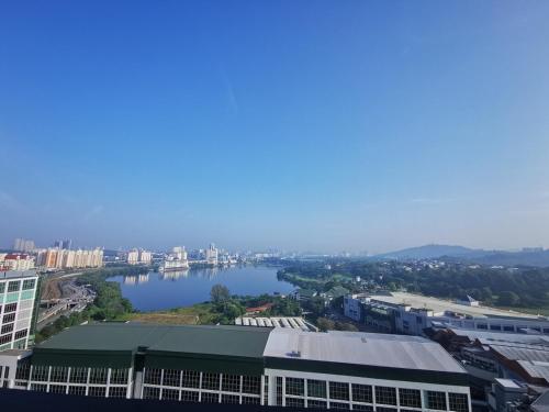 an aerial view of a large city with a river at Astetica5 4BR Spacious Home w Netflix WiFi in Serdang