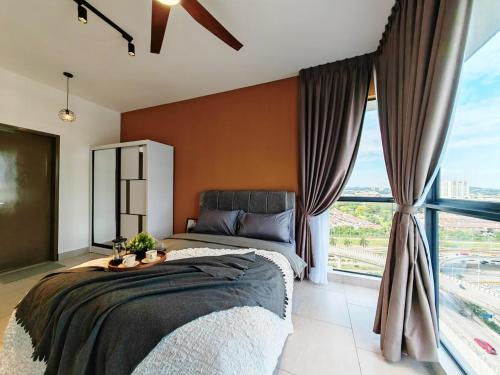 a bedroom with a large bed and a large window at Astetica5 4BR Spacious Home w Netflix WiFi in Serdang