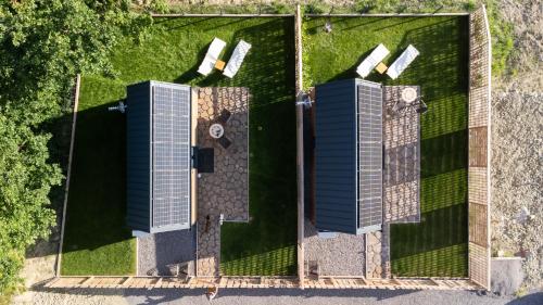 an overhead view of two buildings on a lawn at Termalna Osada in Brenna
