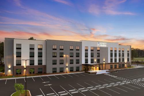 a rendering of a hotel with a parking lot at Hyatt Studios Mobile/Tillmans Corner in Mobile