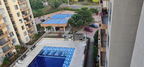 an overhead view of a swimming pool in a city at Hacienda Peñalisa Mango in Ricaurte
