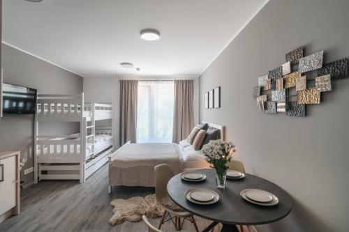 Postel nebo postele na pokoji v ubytování Vltavín Relax Apartments