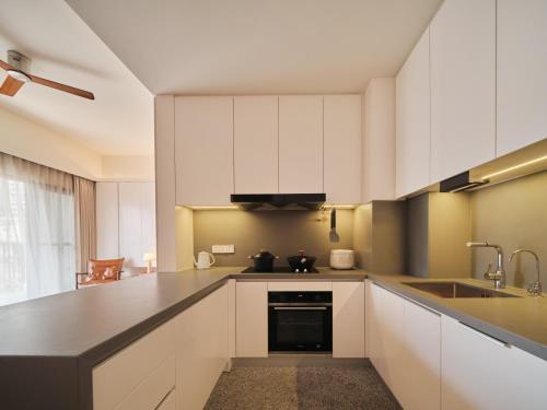 Kuchyň nebo kuchyňský kout v ubytování Wutong Hotel Apartment Bao'an Center