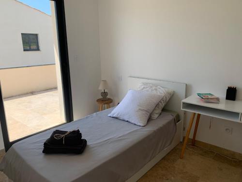 Ένα ή περισσότερα κρεβάτια σε δωμάτιο στο Villa MTI Ventoux
