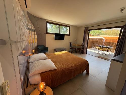 Postel nebo postele na pokoji v ubytování GuestHouse Le Patio34