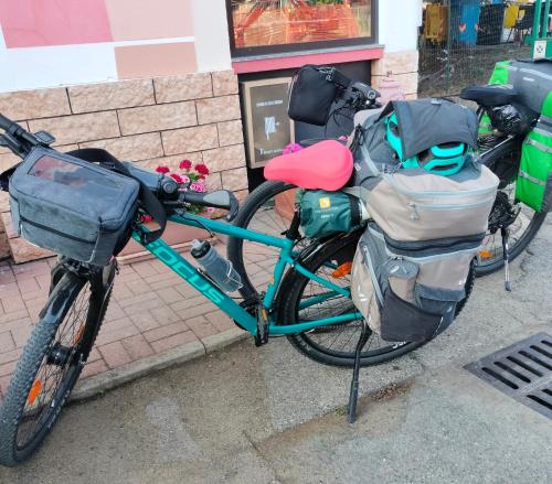a bike parked on the side of a street at Hotel Matteotti in Vercelli