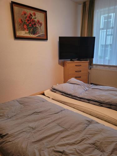 Postel nebo postele na pokoji v ubytování Zinnowitz, Dünenstr 36 WE 12