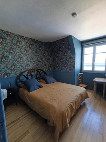 Llit o llits en una habitació de L'amoureuse