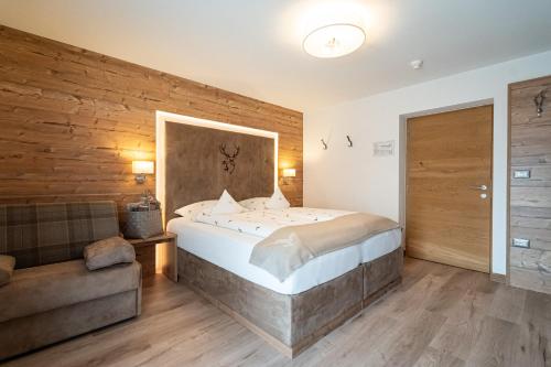 Postel nebo postele na pokoji v ubytování Hotel Jägerheim 3S