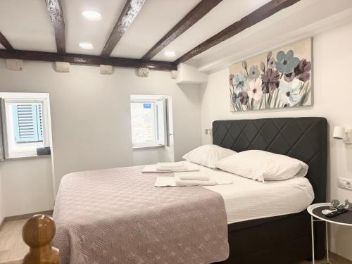 Posteľ alebo postele v izbe v ubytovaní Apartman Mama Marija