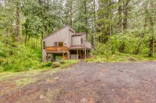 a house in the middle of a forest at The Burrow at Zig Zag in Rhododendron