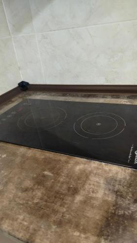a ping pong court on the floor in a room at Nata haus in Kvariati