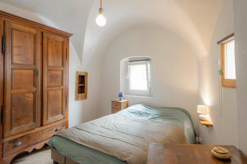 Ένα ή περισσότερα κρεβάτια σε δωμάτιο στο Maison avec 2 chambres dans un village préservé