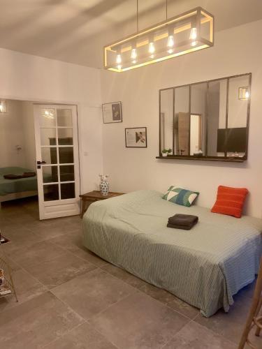 Postel nebo postele na pokoji v ubytování Le Cocon Chic Choc et Cosy