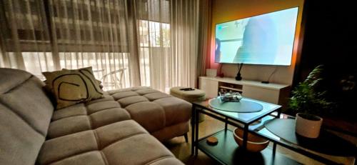 Μια τηλεόραση ή/και κέντρο ψυχαγωγίας στο Apartment in the heart of the city
